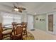 Cozy dining area with seating for six and a view of the wine cellar at 4 Oceans West Blvd # 502D, Daytona Beach Shores, FL 32118