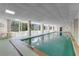 Enjoy year-round swimming in this bright indoor pool with seating and large windows offering views of the lush outdoors at 4 Oceans West Blvd # 502D, Daytona Beach Shores, FL 32118