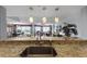 Open concept kitchen with granite countertops and view of the living area at 4 Oceans West Blvd # 502D, Daytona Beach Shores, FL 32118