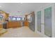 Modern kitchen with stainless steel appliances and custom cabinets, and pantry at 4 Oceans West Blvd # 502D, Daytona Beach Shores, FL 32118
