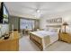 Comfortable bedroom with light walls, hardwood floors, and a bright, airy atmosphere at 4 Oceans West Blvd # 502D, Daytona Beach Shores, FL 32118