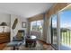 Cozy sitting area with a balcony and view of the city and nature at 4 Oceans West Blvd # 502D, Daytona Beach Shores, FL 32118