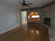 Spacious living room featuring a fireplace and hardwood floors at 4415 Raymar Dr, Orlando, FL 32839