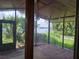 View of a water view from the screened lanai/patio with brick floor at 4415 Raymar Dr, Orlando, FL 32839