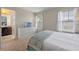 Bedroom with a double bed, dresser with TV and ensuite bathroom at 5172 Oakbourne Ave, Davenport, FL 33837