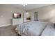 Comfortable bedroom featuring neutral decor and a view of the living room at 5172 Oakbourne Ave, Davenport, FL 33837
