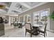 Beautiful clubhouse featuring stylish seating, elegant lighting, and views of the pool at 5172 Oakbourne Ave, Davenport, FL 33837