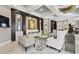 Bright living room with modern decor, stylish furniture, and decorative wall art at 5172 Oakbourne Ave, Davenport, FL 33837