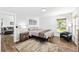 Comfortable bedroom with wood floors, light walls and comfortable furnishings at 5430 Nw 55Th Pl, Ocala, FL 34482