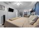 Inviting bedroom featuring a comfortable bed and plenty of closet space at 565 S Floyd Cir, Deltona, FL 32725