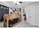 Charming bedroom featuring a bunk bed, decorations, and a spacious closet at 565 S Floyd Cir, Deltona, FL 32725