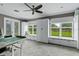 Bright bonus room featuring built in storage, carpet flooring, and backyard views at 5740 Aloma Woods Blvd, Oviedo, FL 32765