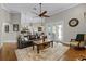 Spacious living room with French doors that have plenty of natural light at 5740 Aloma Woods Blvd, Oviedo, FL 32765