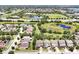 Aerial view of the community, showcasing its ponds, green spaces, and proximity to local amenities at 6925 Trellis Vine Loop, Windermere, FL 34786