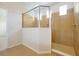 Tile shower with glass enclosure in a naturally lit bathroom at 6925 Trellis Vine Loop, Windermere, FL 34786