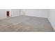 Large bedroom with neutral colored walls and plush carpet at 6925 Trellis Vine Loop, Windermere, FL 34786