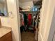 Organized walk-in closet with shelving and storage, providing ample space for clothes and accessories at 7601 Fort Sumter Dr, Orlando, FL 32822