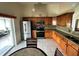 Well-equipped kitchen with stainless steel appliances and light wood cabinetry at 7601 Fort Sumter Dr, Orlando, FL 32822