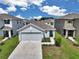 Charming single-Gathering home with a two-car garage, landscaped front yard, and neutral color palette at 8618 Sw 46Th Ave, Ocala, FL 34476