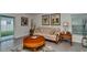 Cozy living room featuring comfortable furniture, stylish decor, and a sliding glass door at 8618 Sw 46Th Ave, Ocala, FL 34476
