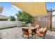 Beautiful backyard patio with pavers, pergola and outdoor furniture at 9024 Alba Ln, Kissimmee, FL 34747
