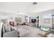 Bright upstairs loft features a cozy sitting area, bright windows, play area, and cat tower at 9024 Alba Ln, Kissimmee, FL 34747