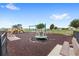 Community playground with swings, slides and benches for relaxing at 9024 Alba Ln, Kissimmee, FL 34747
