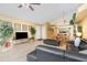 Inviting living room featuring ample seating and a seamless flow to the dining area at 2727 N Poinciana Blvd # 134, Kissimmee, FL 34746