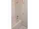 Simple shower and tub combination with tiled walls and shower head at 1027 Sheeler Hills Dr, Apopka, FL 32703