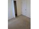 Neutral bedroom featuring a closet and ample natural light from the window at 1027 Sheeler Hills Dr, Apopka, FL 32703