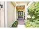 Inviting front entry featuring double doors and manicured landscaping at 10275 Henbury St, Orlando, FL 32832