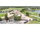 An aerial view of the golf course clubhouse and parking lot lined with golf carts at 10275 Henbury St, Orlando, FL 32832