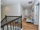 Upstairs hallway with a comfortable couch that leads to the bedrooms at 10275 Henbury St, Orlando, FL 32832