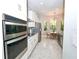 A bright kitchen with stainless steel appliances and a breakfast nook at 10275 Henbury St, Orlando, FL 32832