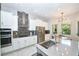 Well-appointed kitchen with stainless steel appliances, a modern backsplash, and a breakfast nook at 10275 Henbury St, Orlando, FL 32832