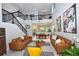 Spacious living room with comfortable seating and a modern staircase at 10275 Henbury St, Orlando, FL 32832