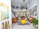 Bright open-concept living room with soaring ceilings and stylish decor at 10275 Henbury St, Orlando, FL 32832