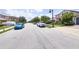 Street view of a quiet neighborhood with tidy landscaping and well-kept homes at 10275 Henbury St, Orlando, FL 32832