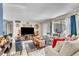 Bright living room featuring neutral paint, large window, and comfortable seating at 10359 Smyrna Dr, Orlando, FL 32817