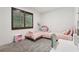 Bedroom offering twin beds, a desk, and window seating perfect for studying or relaxing at 10423 Belfry Cir, Orlando, FL 32832