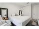 Bedroom with neutral tones, with a queen bed, closet, and seating area for relaxation at 10423 Belfry Cir, Orlando, FL 32832