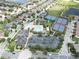Aerial view of community amenities including pools, tennis courts, basketball courts, and clubhouse at 10423 Belfry Cir, Orlando, FL 32832