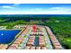 Aerial view highlighting residential neighborhood with private pools and proximity to nature at 1512 Mumbai Way, Kissimmee, FL 34747