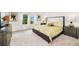 Inviting bedroom with a plush bed, art prints, and a bright window at 1512 Mumbai Way, Kissimmee, FL 34747