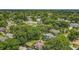 A beautiful neighborhood is captured in this aerial shot, complete with mature trees and manicured lawns at 1606 Orangewood Ave, Orlando, FL 32806