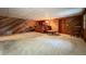 Finished basement featuring wood paneled walls, wet bar, and comfortable carpet at 1606 Orangewood Ave, Orlando, FL 32806