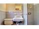 Vintage bathroom featuring tiled walls at 1606 Orangewood Ave, Orlando, FL 32806