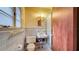 Classic bathroom with tiled walls and a shower at 1606 Orangewood Ave, Orlando, FL 32806