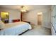 Spacious bedroom with walk-in closet and attached bathroom at 1606 Orangewood Ave, Orlando, FL 32806