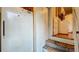 Laundry area with washer, dryer and refrigerator in a narrow utility space at 1606 Orangewood Ave, Orlando, FL 32806